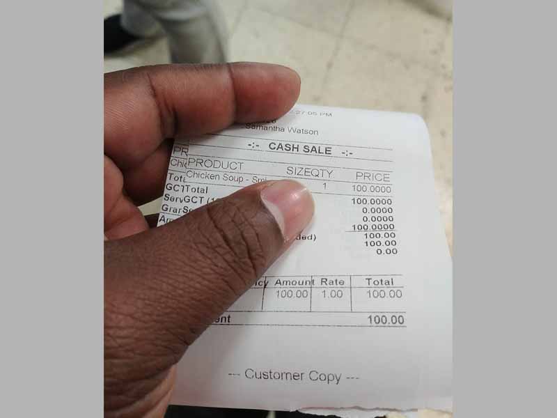 black hands holding invoice or receipt