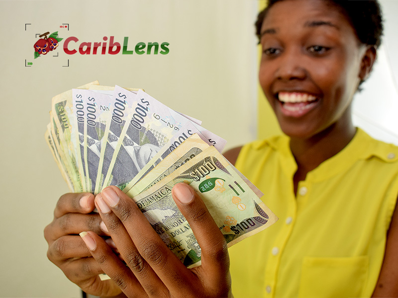 Young beautiful Black African girl holding allot of money in her hands – lottery winner
