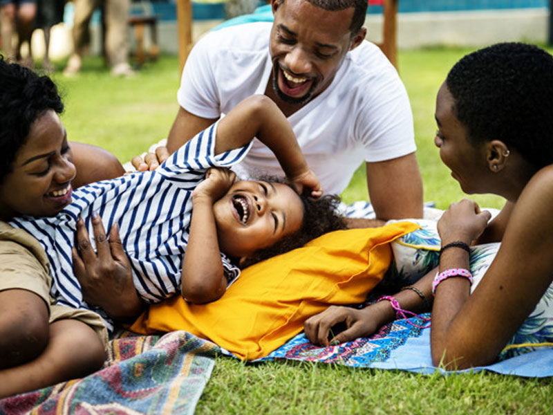 African black family enjoying summer together in their backyard – Free Photo