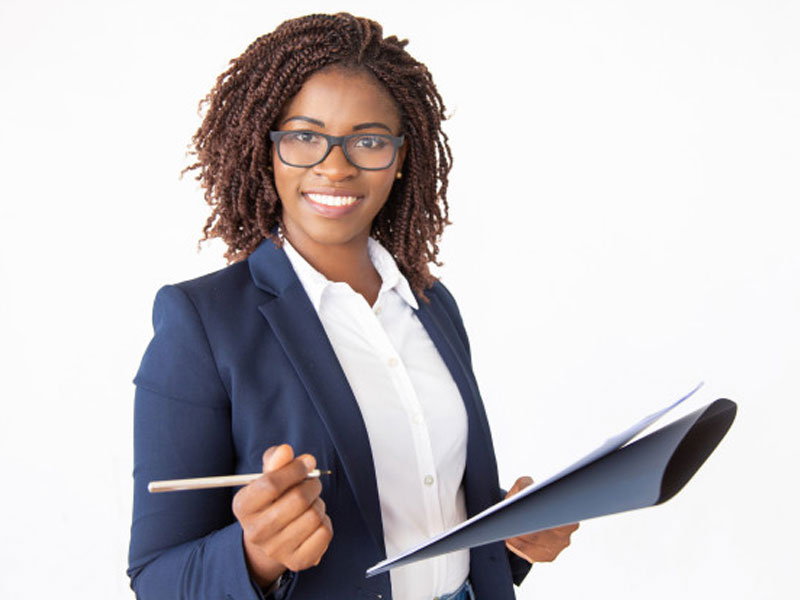 African black Business woman leader with pen and paper in hands signing agreement – Free Photo