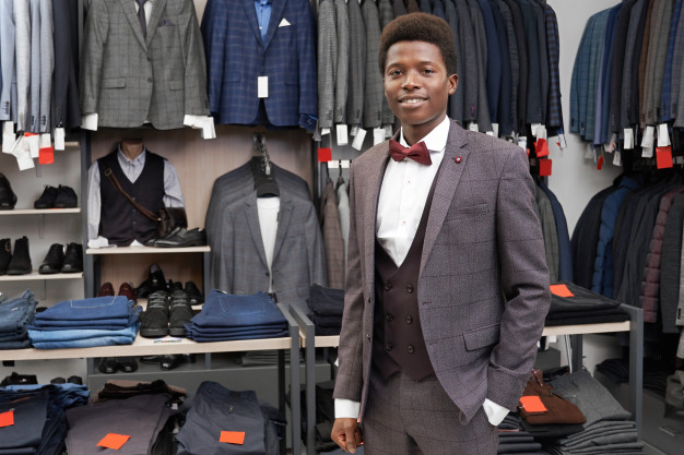 African American black man – Client of boutique holding hand in pocket of pants, posing. Free Photo