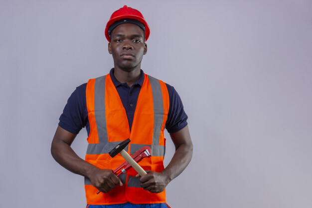 African American black construction worker wearing vest and safety