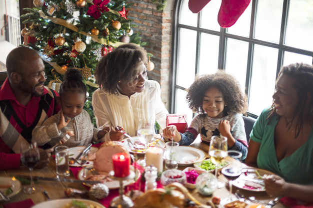 African American black family having Christmas dinner – free photo