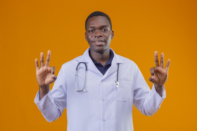 Young African American Doctor Wearing White Coat With Stethoscope Relaxing Doing Meditation Gesture With Fingers Smiling 141793 29904