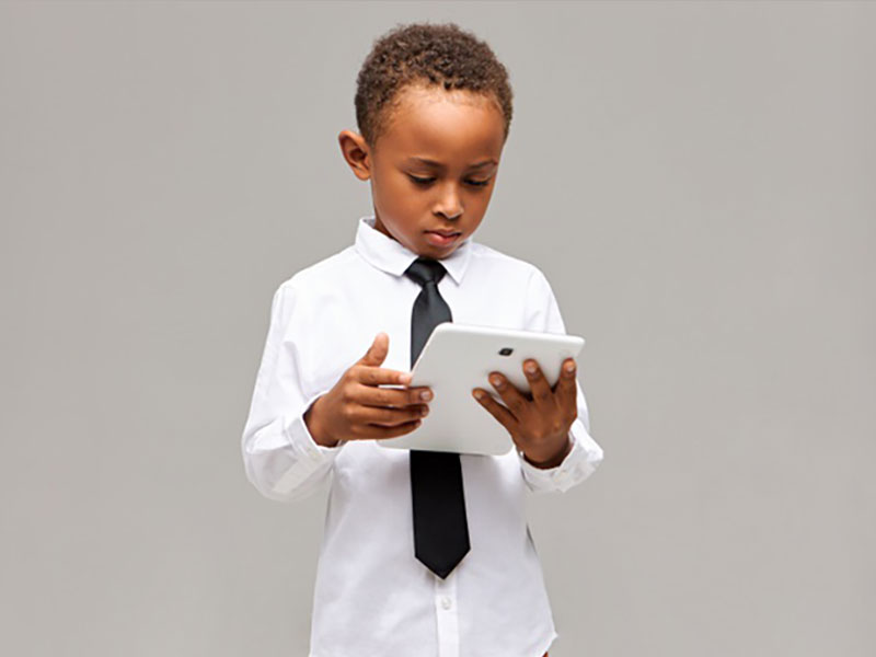 Children Modern Technology Concept Serious Focused Afro American Schoolboy Uniform Holding White Generic Digital Tablet Playing Online Game Learning Having Concentrated Expression 343059 4513