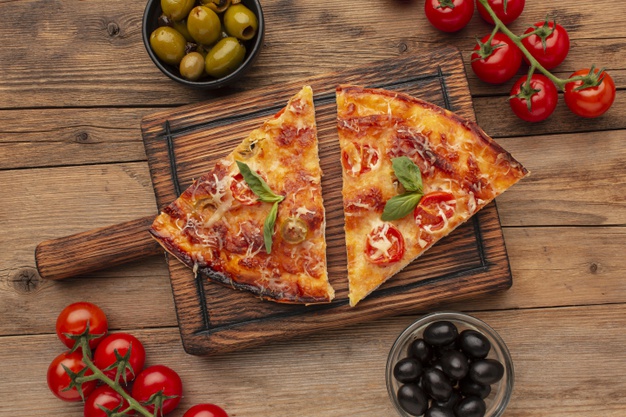 Top view delicious pizza slices Free Photo