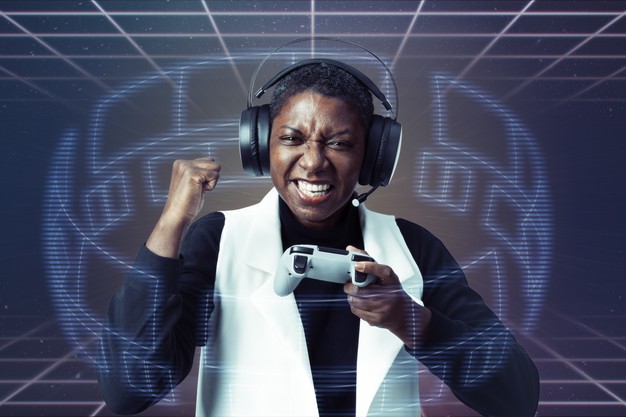 African Black Woman wearing headset playing video games