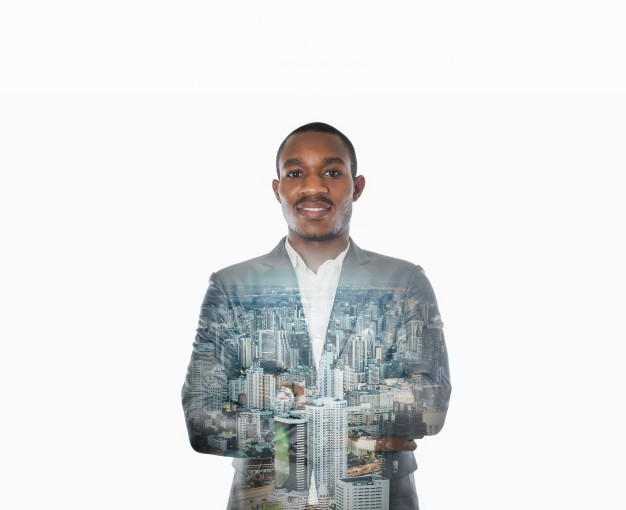 African black businessman with city overlay