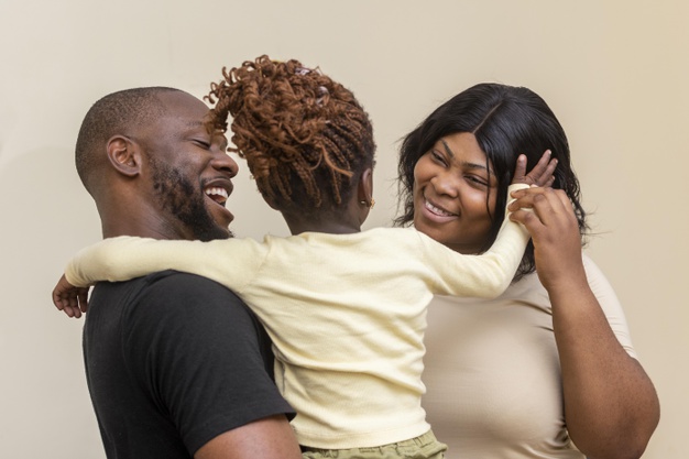 Loving African black father, wife and daughter – family