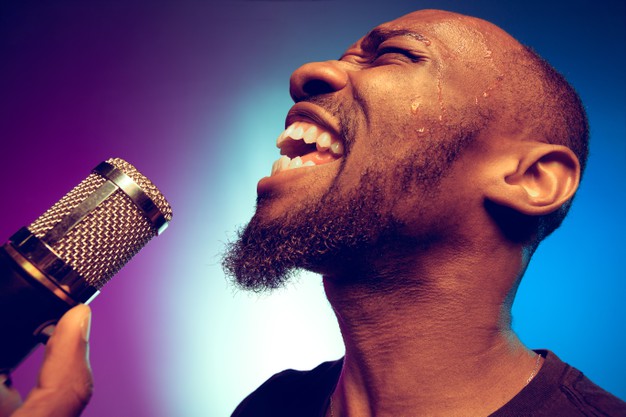 African black man jazz musician singing a song