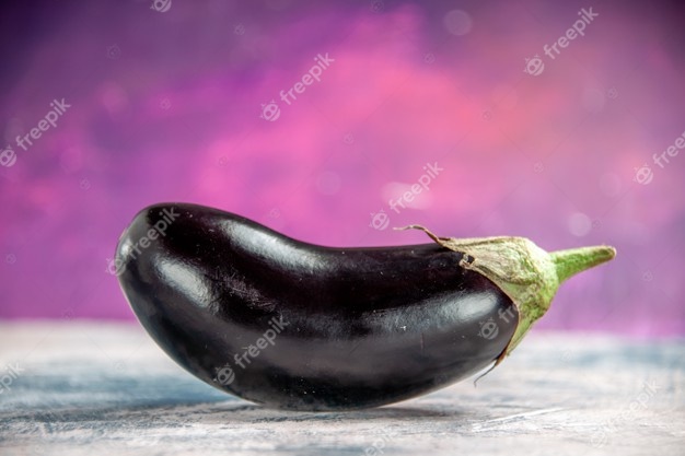 Front view an eggplant on pink Free Photo