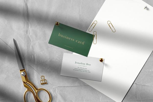 Clean minimal business card mockup on the top paper Free Psd