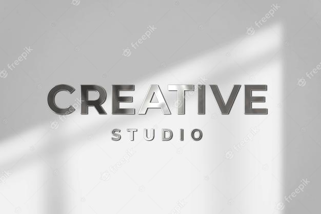 Creative studio business logo psd template in steel texture Free Psd