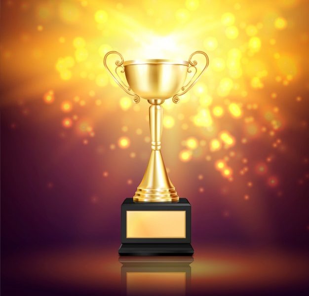 Shiny trophy award realistic composition with glittering particles and image of winner golden cup on pedestal Free Vector