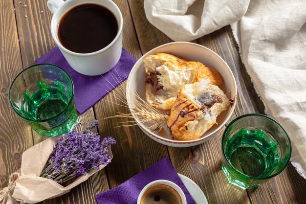 Croissants and coffee for breakfast Free Photo