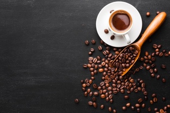 Top view coffee with beans on the table Free Photo