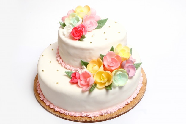 Wedding cake with color flores Free Photo