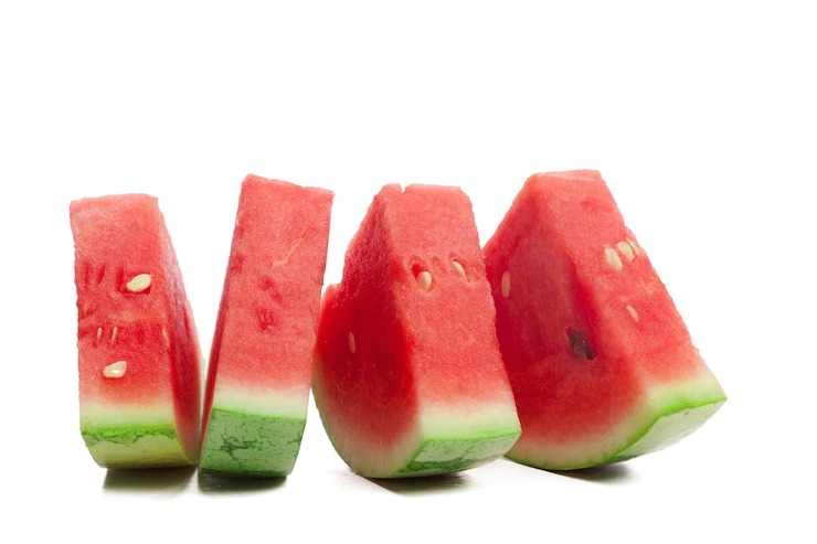 Slice of watermelon on white background Free Photo