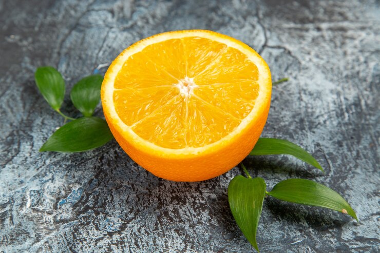 Close Up View Cut Half Fresh Orange With Leaves Gray Background Stock Photo 140725 140024