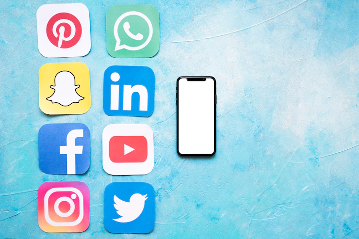Paper Cut Outs Social Media Icons Arranged Near Smartphone 23 2147841403