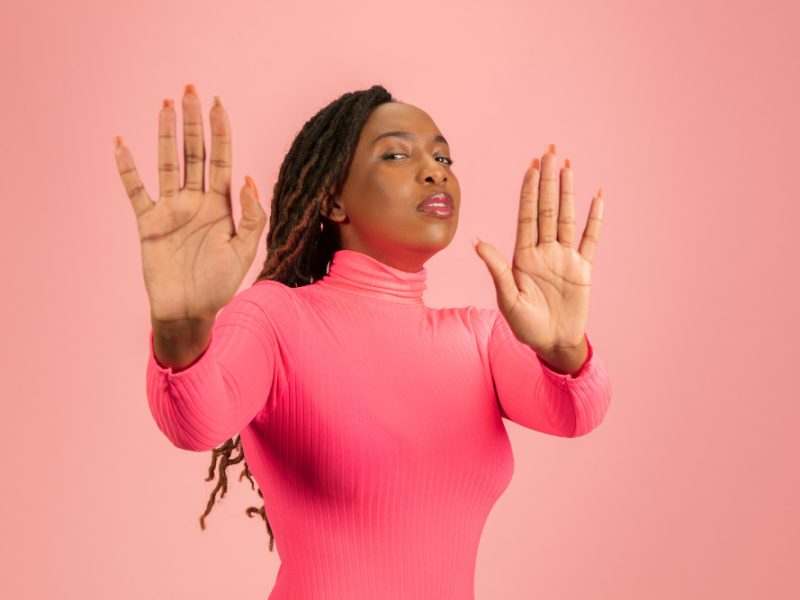 African American black woman or girl – stop gesture saying no with hands African American black woman or girl – stop gesture saying no with hands