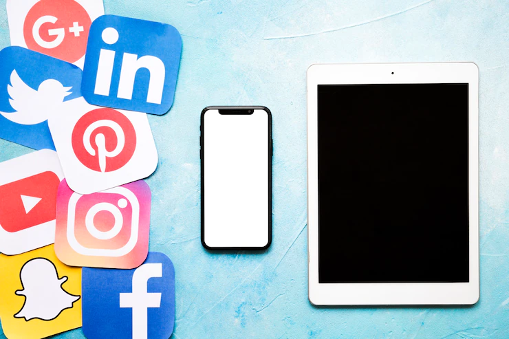 Social Media Icons With Cellphone Digital Tablet Blue Painted Wall 23 2147841217
