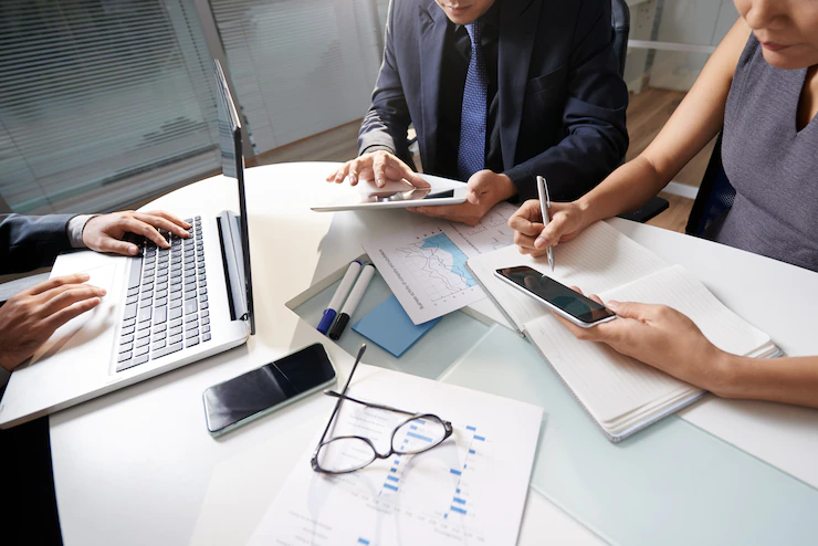 Business People Sitting Office Desk Working Project 1098 17930