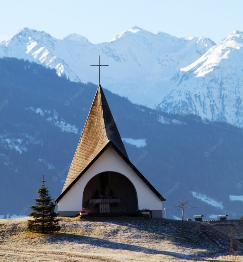 Church with mountains background Free Photo