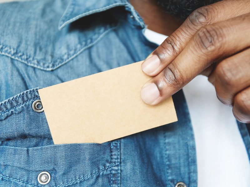 African black man taking out business card from pocket free photo African black man taking out business card from pocket free photo