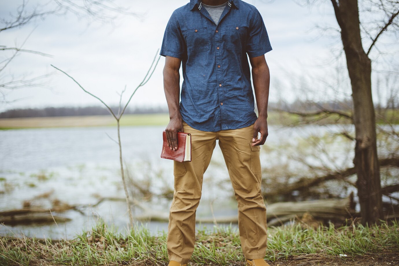 Closeup Shot Male Holding Bible While Standing 181624 8442