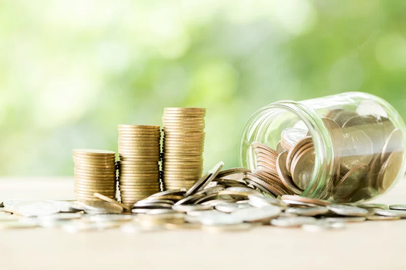 Coin on wooden table Free Photo