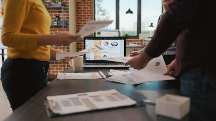 Diverse Group People Doing Teamwork Plan Sales Analysis Researching Documents With Charts Statistics Company Office Workmates Brainstorming Ideas Develop Expertise 482257 37406