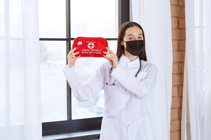Doctor With Stethoscope Black Mask Holding Red First Aid Kit 144627 49776