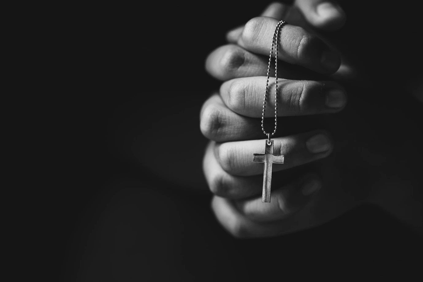 Hands Holding Cross While Praying 1150 18718