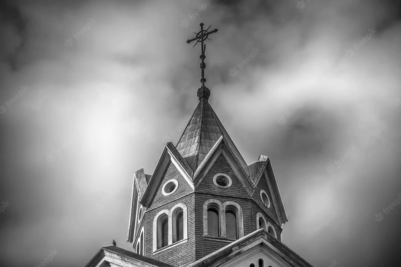 Low Angle Greyscale Shot Top Christian Church With Cloudy Sky 181624 2173