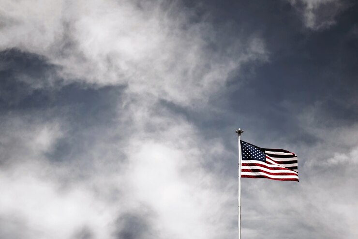 Low Angle Shot American Flag Pole Cloudy Sky 181624 44755