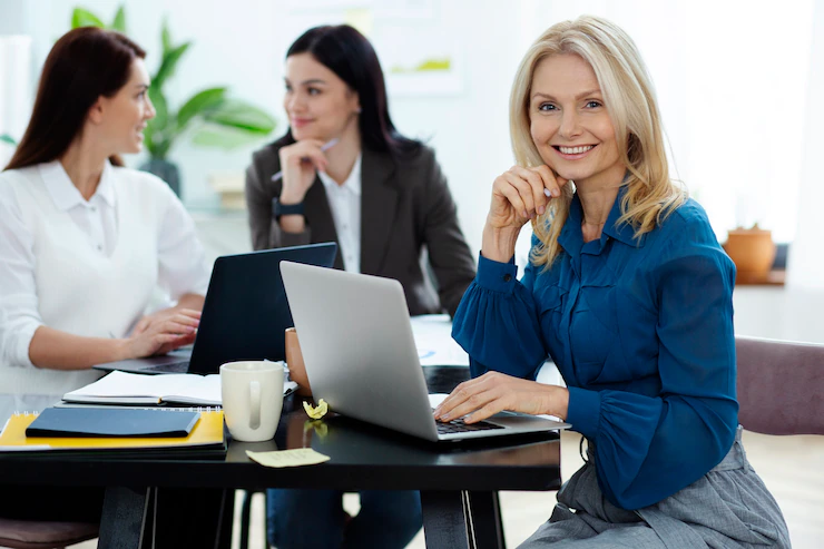 Medium Shot Smiley People Office 23 2149300697