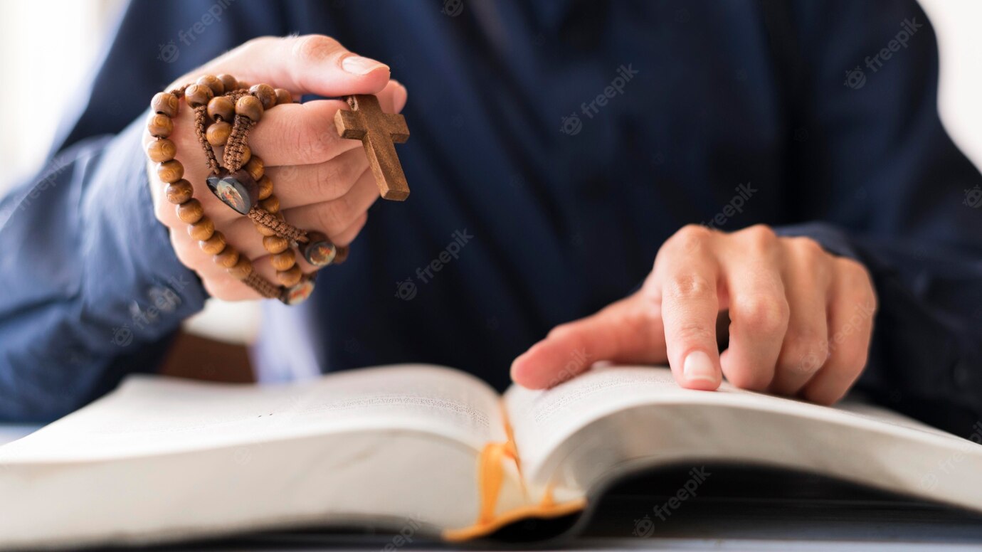 Person Holding Rosary With Cross Praying 23 2148629985