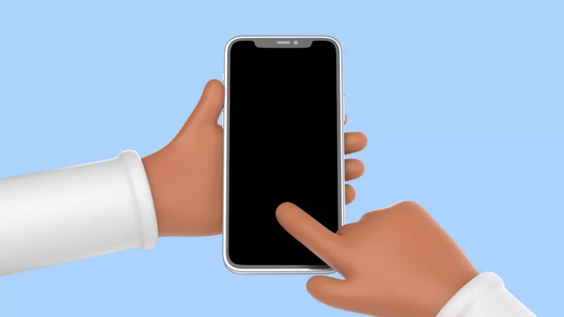 Plastic hands holding smartphone close up Free Psd