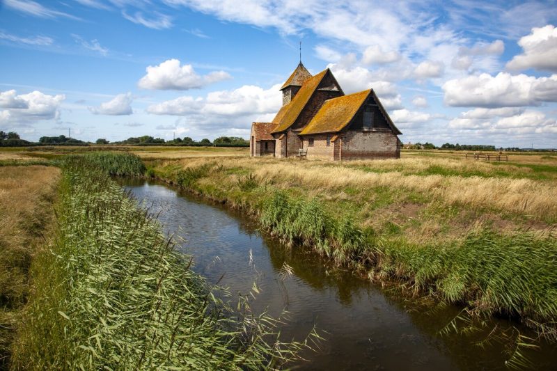 Stunning shot of the thomas a becket church at fairfield on romney marsh kent in the uk Free Photo