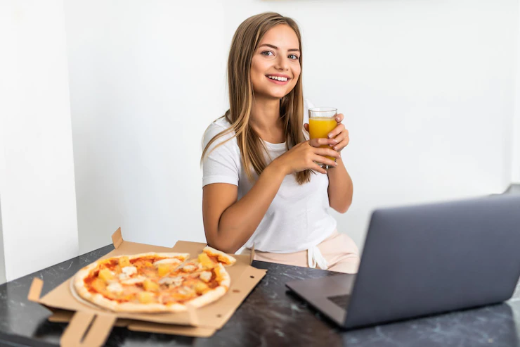 Young Woman Drinks Juice Eating Pizza Looking Laptop Kitchen 231208 13867