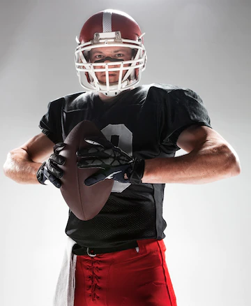 American Football Player Posing With Ball 155003 15551