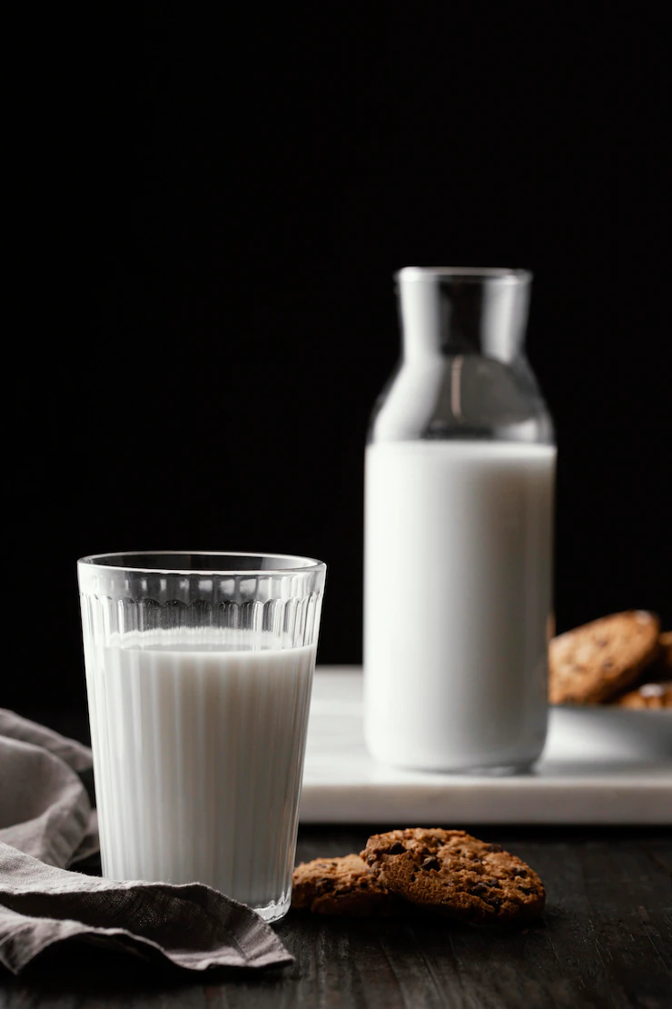 Arrangement of delicious biscuits with milk Free Photo