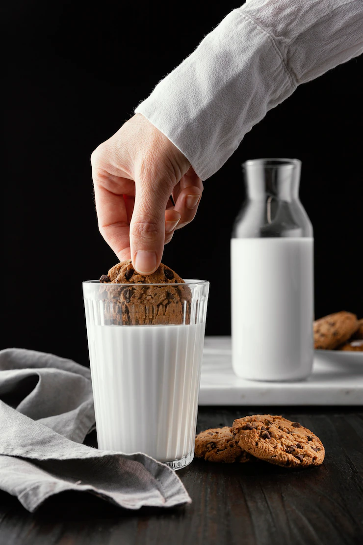 Arrangement of delicious biscuits with milk Free Photo