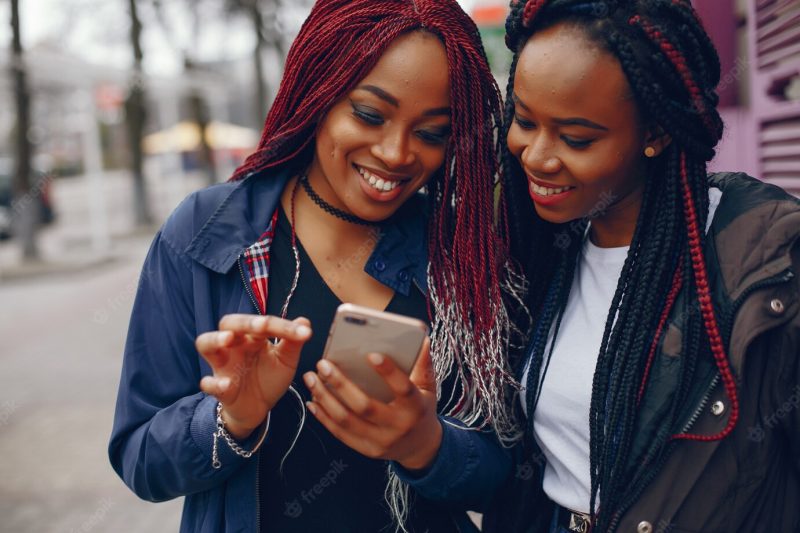 Black girls in a city Free Photo