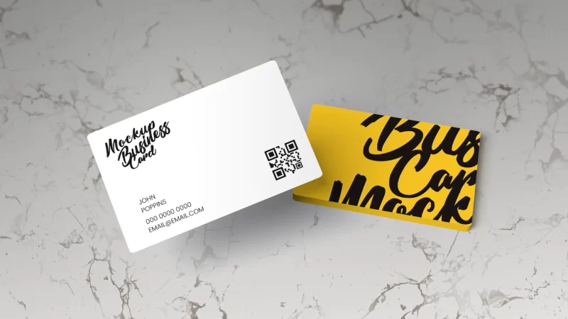 Business cards on marble surface mockup Free Psd