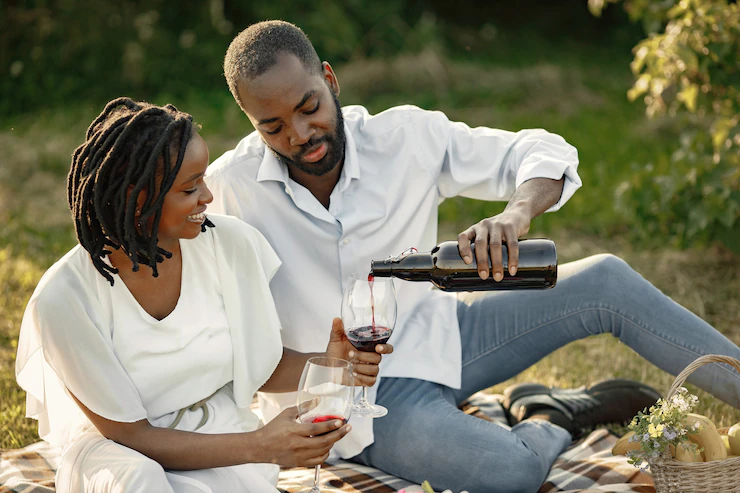 Carefree Relaxed Couple Enjoying Picnic Together Man Poring Wine Into Glass 1157 49783