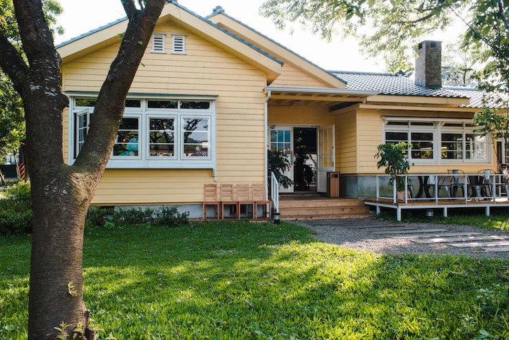 Charming Yellow House With Wooden Windows Green Grassy Garden 181624 8074