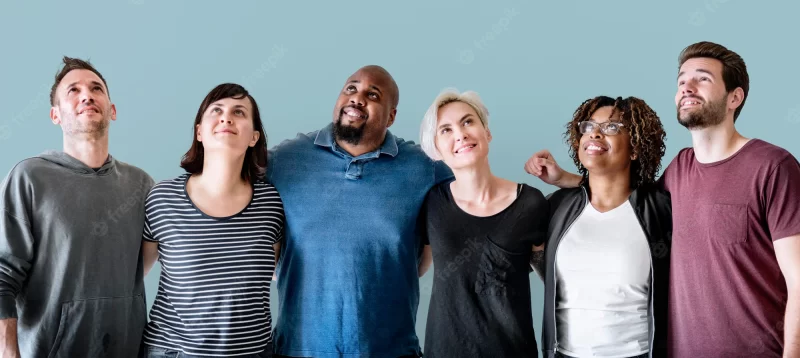 Cheerful diverse friends with arms around Free Photo