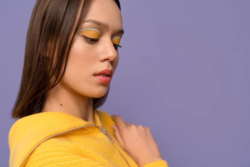 Close up young woman wearing make up Free Photo